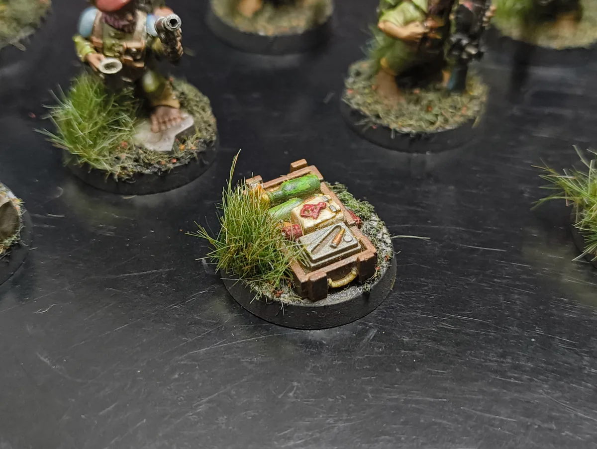 Marcador de suministros pintado para el mismo Kill Team